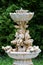 Marble garden water fountain with statues of little boys and fish. The palace and park complex Manor Tarnowski, s.Kachanovka, Ukra
