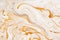Marble golden, orange and white raster texture. Mineral stone macro surface. Color liquid flow, fluid effect wallpaper