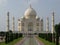 Marble mausoleum with its four minarets. Taj Mahal