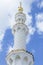 Marble pillar with domes of Sheikh Zayed Grand Mosque with blue sky in the morning at Abu Dhabi, UAE