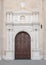 Marble portal in Gothic-Renaissance style of the dome in Montagnana, Italy.