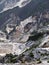 Marble quarry view with hairpin mountain road views, Italy