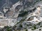 Marble quarry view with hairpin mountain road views, Italy