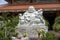 Marble sculpture of the happy Buddha with children in a Buddhist temple in the city of Danang, Vietnam