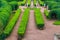 Marble statue of goddess Flora surrounded by marble bacchantes and satyrs in Private Garden of Gatchina palace, Russia