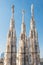 Marble statues - architecture on top of roof Duomo