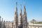 Marble statues - architecture on top of roof Duomo