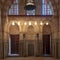 Marble wall with mihrab niche, wooden doors, huge arches and stained glass windows, Khayer Bek Mausoleum, Old Cairo, Egypt