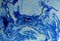 Marbled blue abstract background. Liquid marble pattern