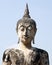 Marbled Buddha Face against Blue Sky