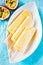 Marbled yoghurt and passion fruit popsicles