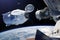 March 03, 2019: SpaceX Crew Dragon spacecraft in low-Earth orbit. Elements of this image furnished by NASA