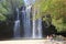 March 10 2023 - Bagaces, Guanacaste, Costa Rica: People enjoy playing and swimming at Llanos the Cortes waterfall in Bagaces
