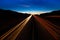 MARCH 12, 2017, LAS VEGAS, NV - streaked lights at sunset over Interstate 15, south of Las Vegas, Nevada at sunset