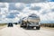 March 15 2018 Lost Hills / CA / USA - Tanker truck driving on interstate I5, the road being reflected in its shiny cistern