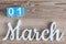 March 1st. Day 1 of march month, color calendar on wooden background. Spring time begining