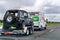 March 20, 2019 Los Angeles / CA / USA - U-Haul van travelling on the interstate, hauling a Jeep; U-Haul is an American company