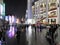 March 20, 2019 - Night scene People Walk & Sightseeing little tram train in Nanjing Road Pedestrian Street, Shanghai, China