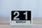 March 21st. Day 21 of month, everyday calendar on wooden table background. Spring time, empty space for text