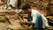 March 8 2016 Mandalay, Myanmar. Artisan making a Buddha statue from teak wood piece - Myanmar - 3 videos sequence