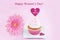 March 8 Women\'s Day pink greeting card with cupcake, heart and gerbera daisy.