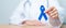 March Colorectal Cancer Awareness month, doctor with dark Blue Ribbon for supporting people living and illness. Healthcare, hope