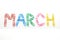 March month, word made from colorful paper clips