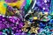 Mardi Gras Carnaval background - bright beautiful colors with mask and beads