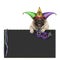 Mardi gras carnival pug dog with carnival hat, beads, harlequin jester hat and venetian mask hanging on blackboard sign