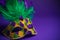 Mardi Gras or Carnivale mask on a purple background