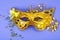 Mardi Gras Festival. Luxurious masquerade Venetian carnival mask on purple background