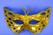 Mardi Gras Festival. Luxurious masquerade Venetian carnival mask on purple background