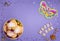 Mardi Gras King Cake Doughnuts or Donuts, Carnival Masks on Purple Background