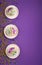 Mardi Gras King Cake Sufganiyot Donuts, Carnival Masks on Purple Background