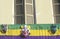 Mardi Gras Masks on Balcony of Building, New Orleans, Louisiana