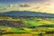 Maremma countryside, rolling hills, trees and Magona forest at sunset. Bibbona, Tuscany, Italy