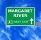 MARGARET RIVER road sign against clear blue sky