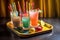 margarita garnishes and colorful straws on a tray