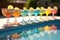 margarita glasses lined up on a sunny poolside table