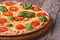 Margarita pizza with tomatoes, cheese and basil