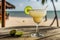 Margarita by the Shore. A Vibrant Classic Cocktail on a Wooden Table with a Serene Sea and Beach Background. Generative