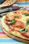 Margaritta pizza with tomatoes and basil cheese