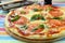 Margaritta pizza with tomatoes and basil cheese