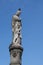 Maria sculpture of stone with a dove on the head, Mary`s column