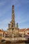 Marian Column at King Vladislav Square, Narrow picturesque street with colorful buildings in historic center of town Velvary in