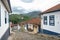 MARIANA, MINAS GERAIS, BRAZIL - DECEMBER 23, 2019: Colonial style houses with mountains in the background in Mariana, Minas Gerais