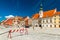 Maribor, Slovenia: View of the main square of Maribor, Town Hall, old historical buildings, walking people, and a stop