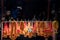 Marigold flower garlands hanging on steel at the Chinese temple, Thailand