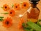 Marigold flowers and homeopathic pills