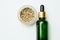Marijuana cosmetic products, CBD oil. Medicinal hemp extract in cosmetic bottles on white background
